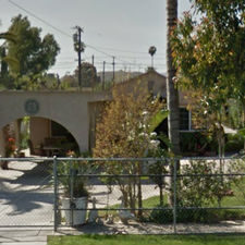 A view of the entrance to a park.